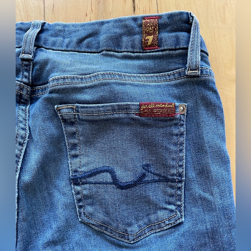 7 for all Mankind low rise medium wash jeans. Size 26